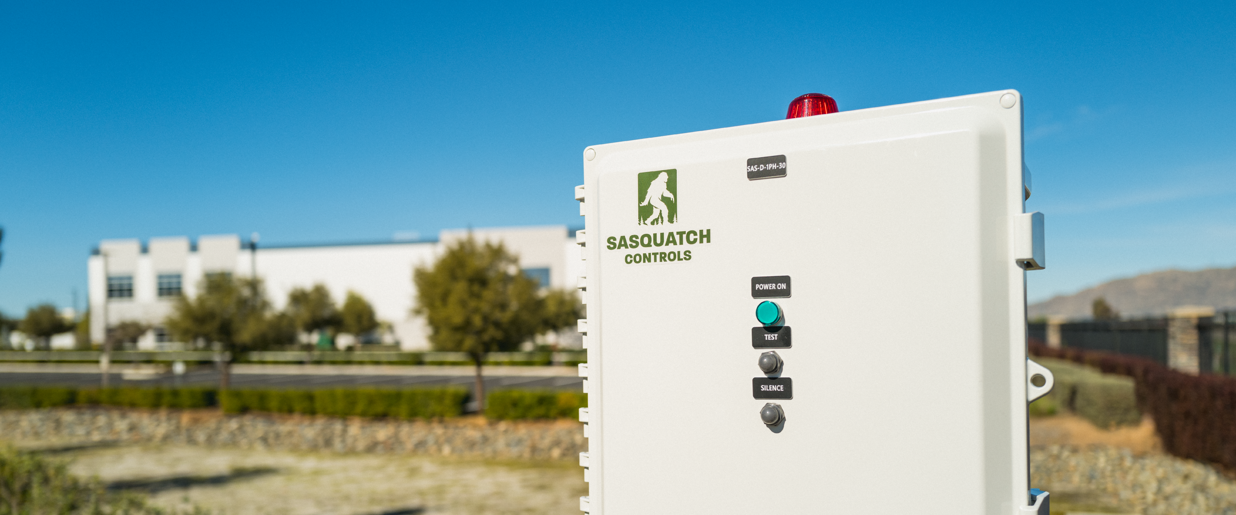 Sasquatch Controls control panel outdoor on a clear day.