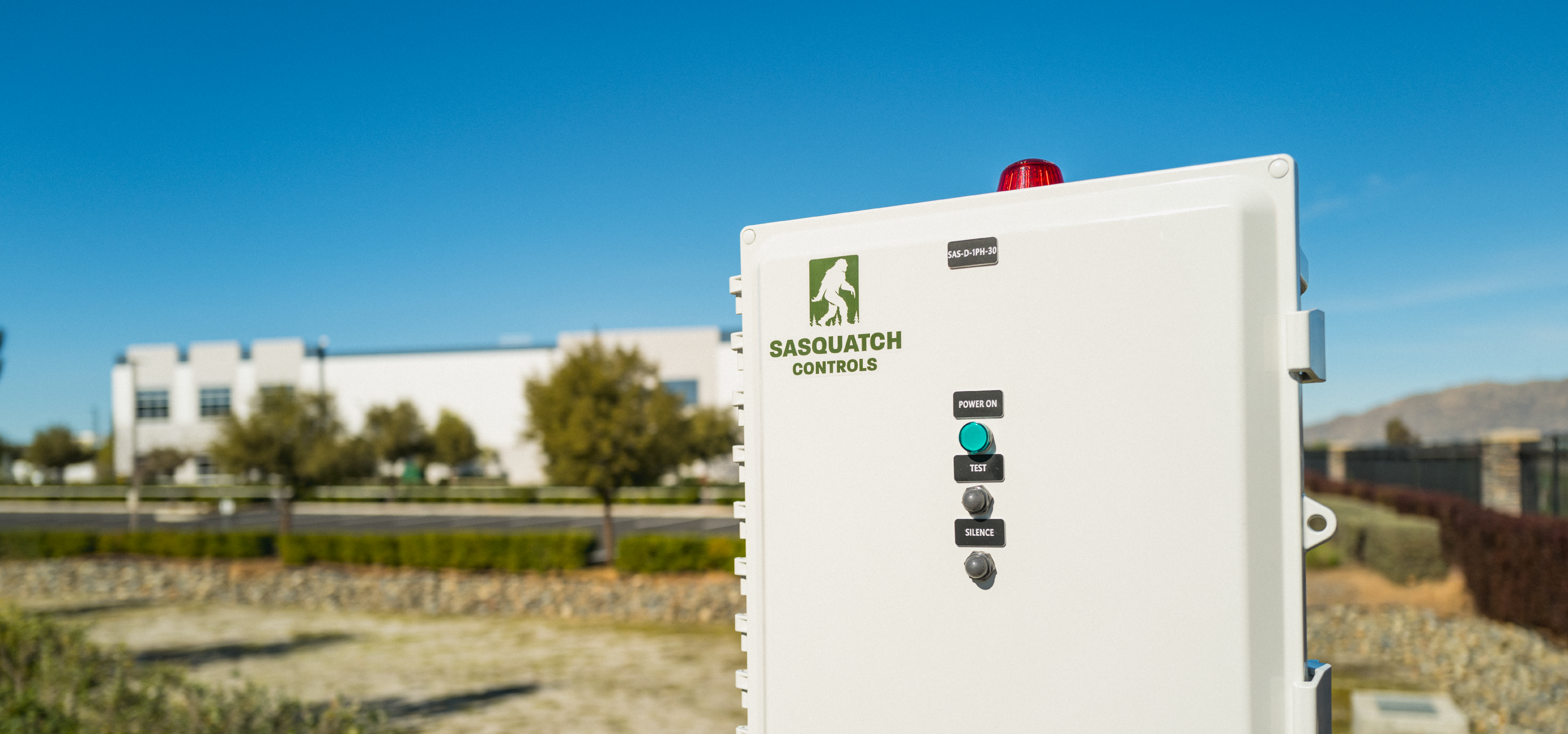 Sasquatch Controls control panel outdoor on a clear day.