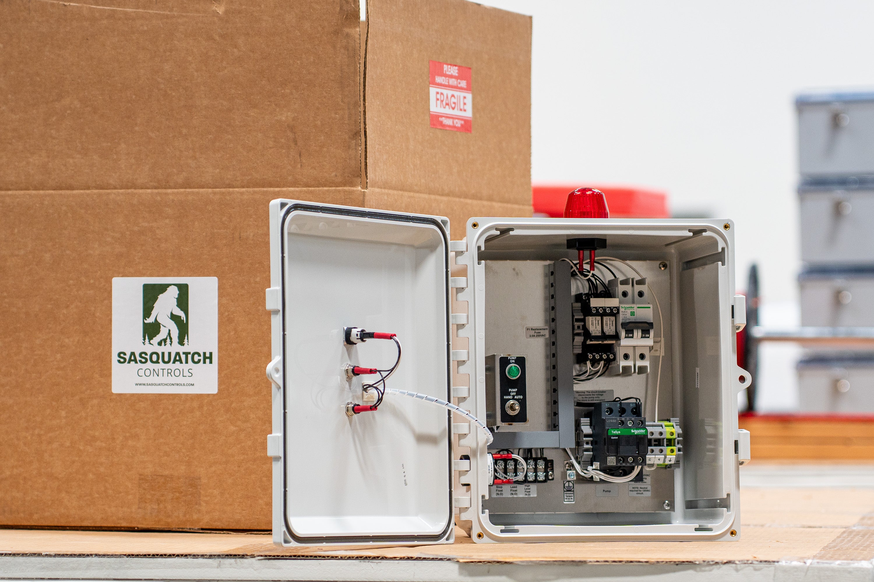 Open control panel sitting in front of shipping box.