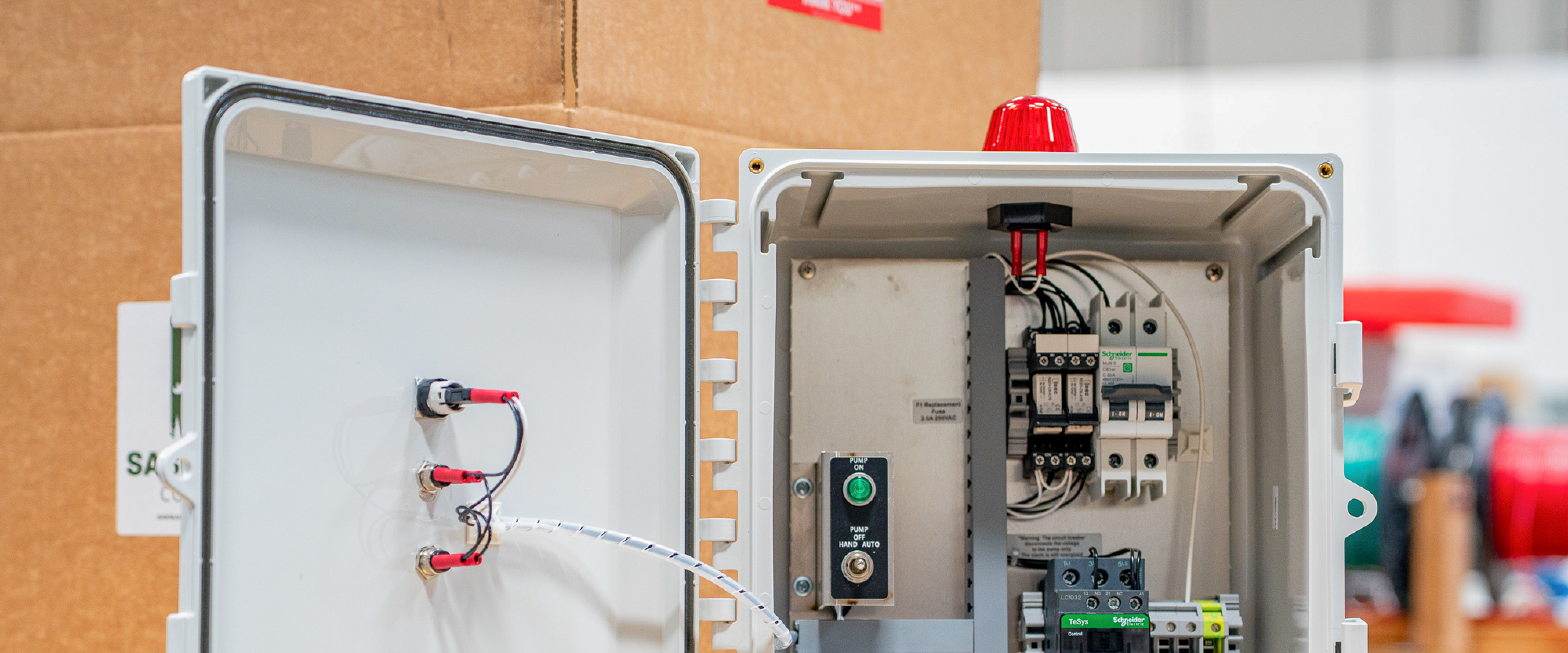 Sasquatch Control panel in front of shipping box. 