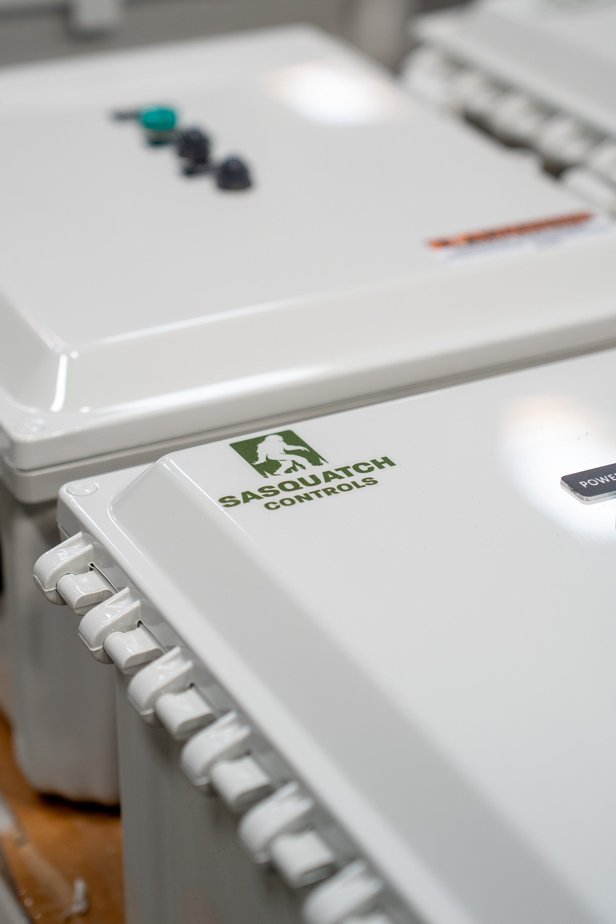 Sasquatch Controls panel with green logo sticker. 