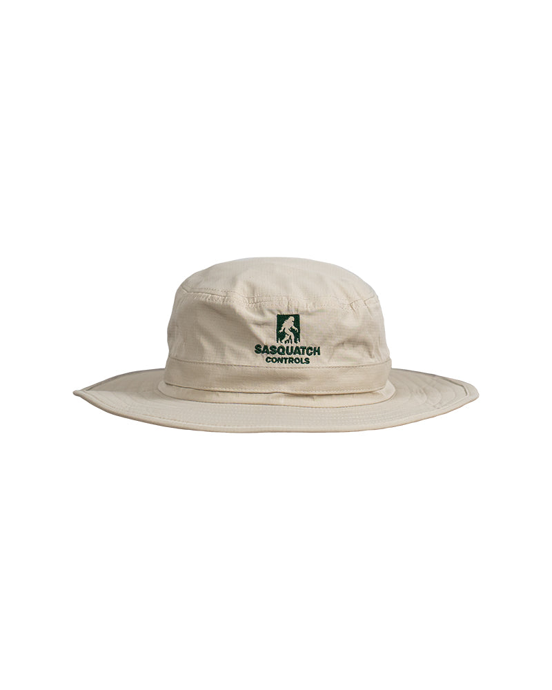 Front of cream Sasquatch Controls embroidered bucket hat.