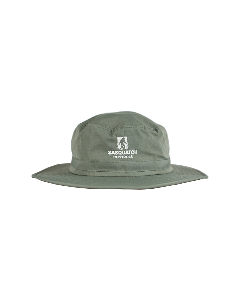 Front of green Sasquatch Controls embroidered bucket hat.