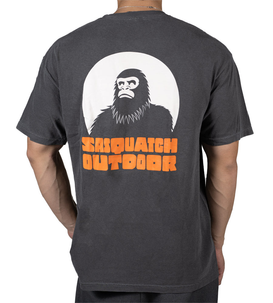 Back of man wearing Sasquatch Outdoor Horizon shirt in pepper